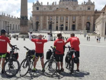 Four pilgrims from Pelplin, northern Poland, arrive in St. Peter’s Square at the Vatican, July 14, 2021.